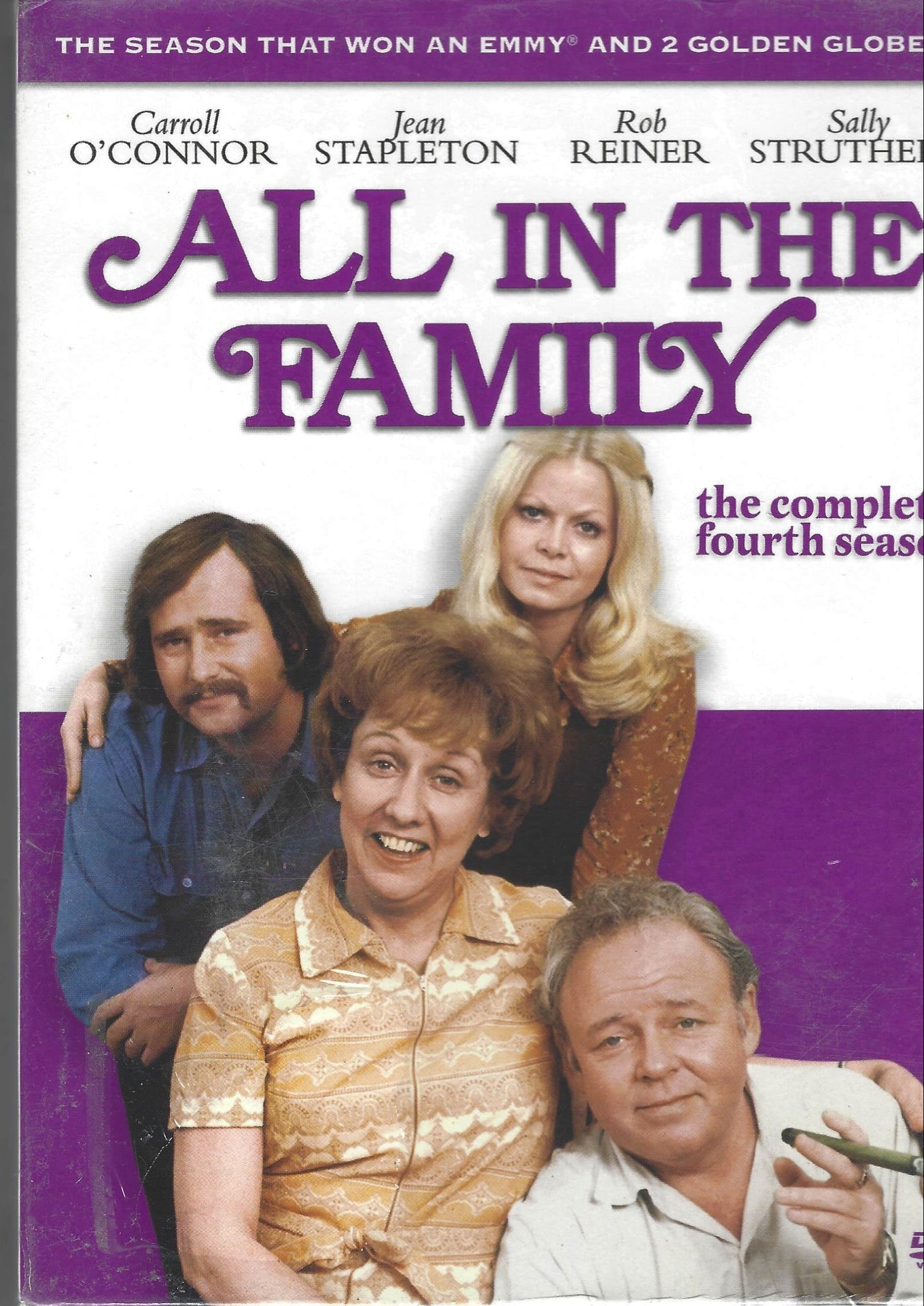 DVD cover of 'All in the Family' with a purple border and family photo.