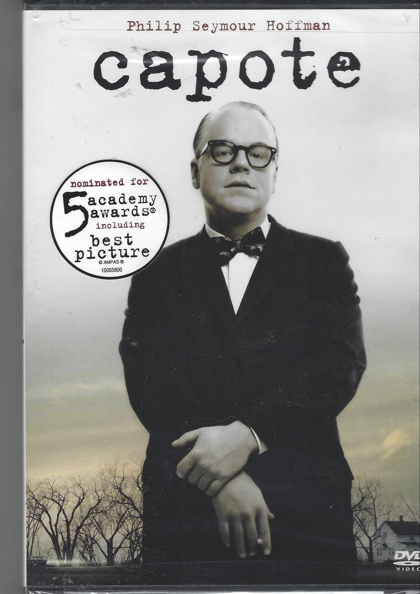 DVD cover of 'Capote' with a black and white photo of a man in a suit and bow tie, set against a gray background.