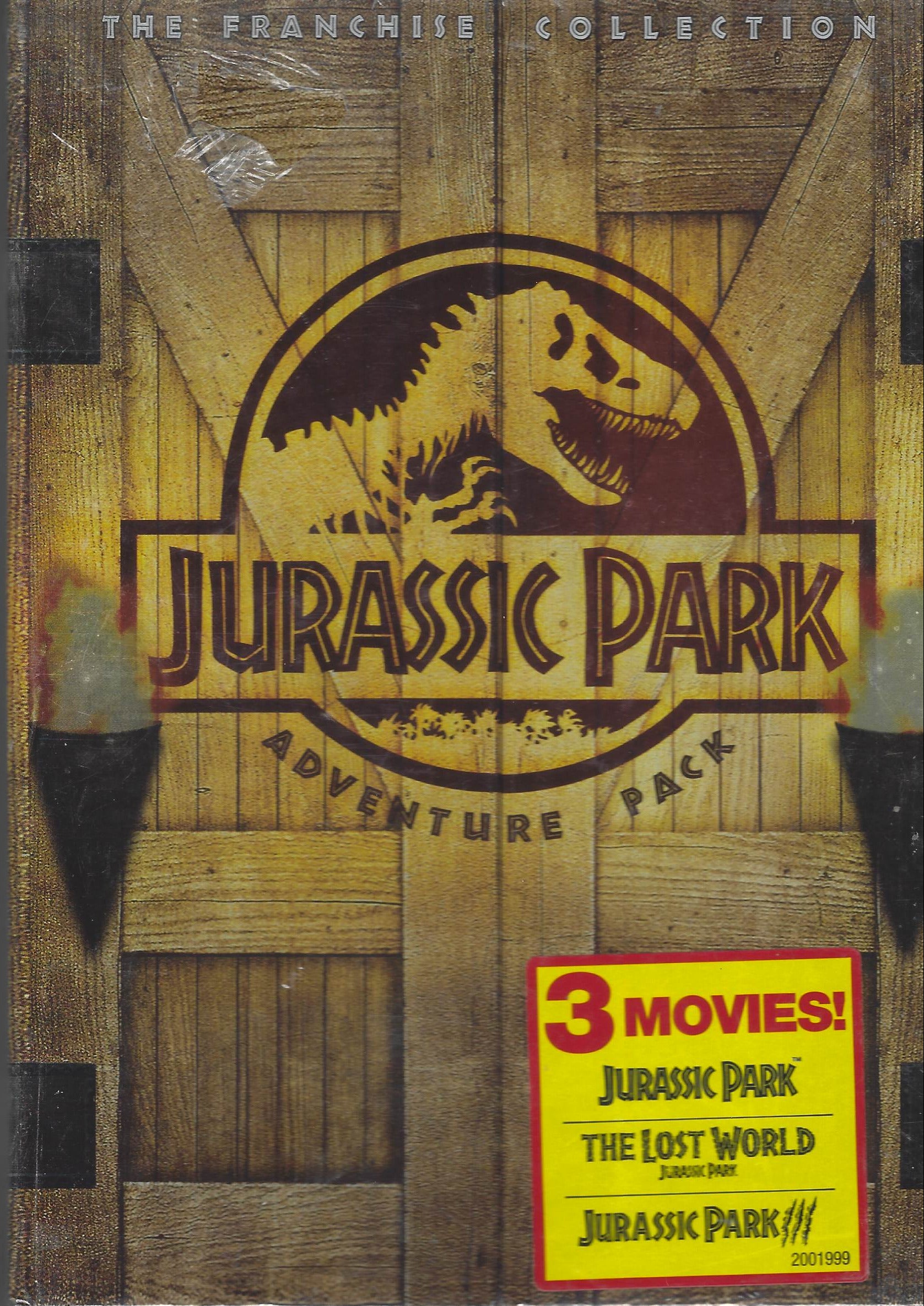 Jurassic Park DVD collection on a wooden background