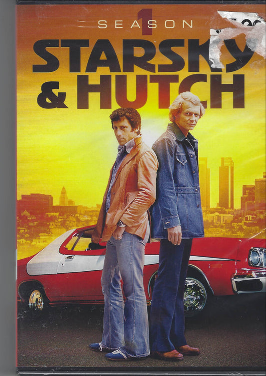 VHS tape cover of 'Starsky & Hutch' with two characters and a car on a yellow background