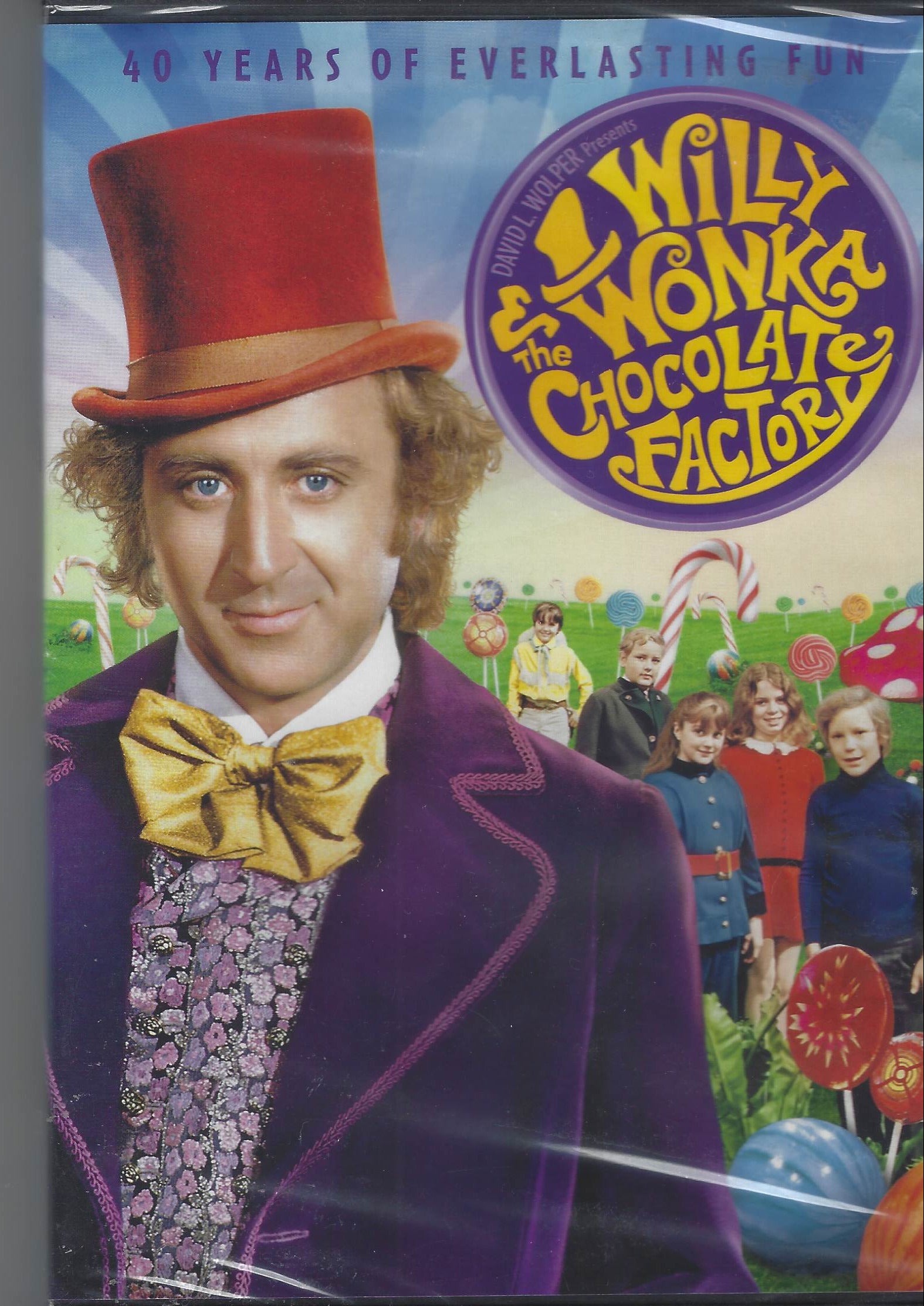 VHS tape cover of 'Willy Wonka & the Chocolate Factory' with a character in a top hat and purple suit.